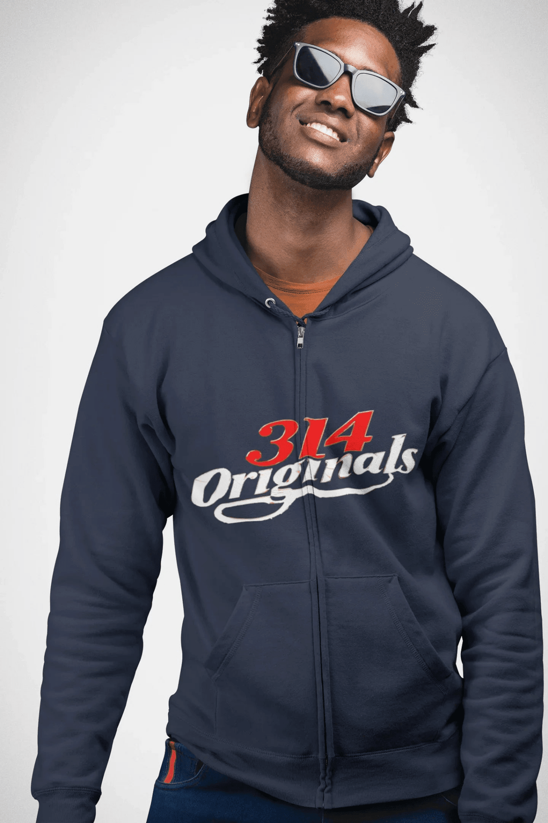 Man wearing 314 Originals Full-Zip Hoodie in navy with retro St. Louis streetwear graphic